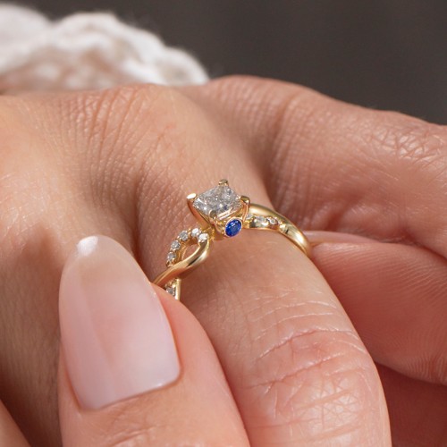 1/2 ct. Princess Gemstone Infinity Peek-A-Boo Engagement Ring with Accent Stones – Sterling Silver with White Premium Zirconia and Blue Sapphire