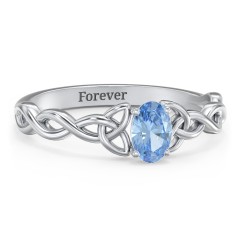 Oval Solitaire Celtic Trinity Knot Engagement Ring – 10K Rose Gold with Blue Topaz