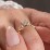 1/2 ct. Princess Gemstone Infinity Peek-A-Boo Engagement Ring with Accent Stones – 10K Rose Gold with White Premium Zirconia and Blue Sapphire