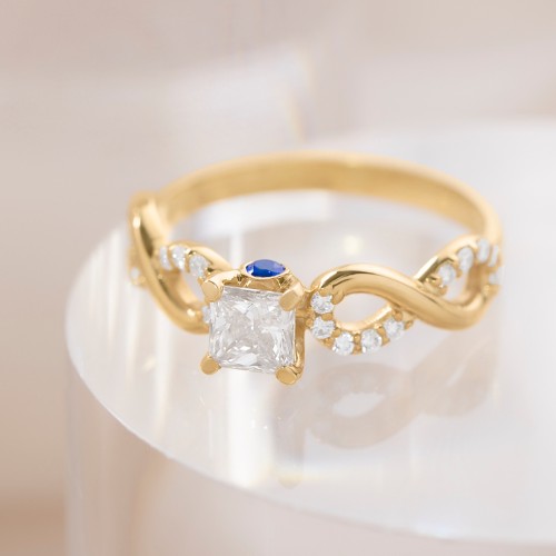 1/2 ct. Princess Gemstone Infinity Peek-A-Boo Engagement Ring with Accent Stones – 10K Rose Gold with White Premium Zirconia and Blue Sapphire