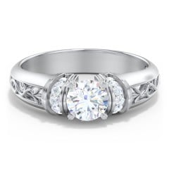 Vintage Solitaire Engagement Ring with Shoulder Accents and Sculptural Band