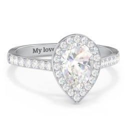 1.5 ct. (9x6mm) Pear Moissanite Halo Engagement Ring with Side Stones