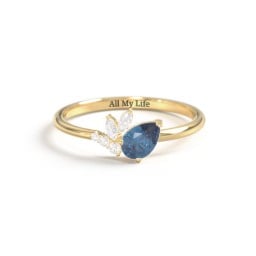 Tilted Pear Gemstone Ring with Cluster Accents