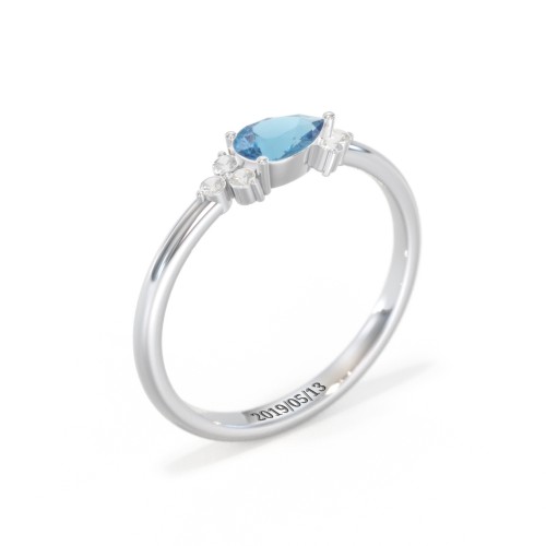 East-West Pear Gemstone Ring With Triple Side Stones – 10K White Gold with Blue Topaz and Cubic Zirconia