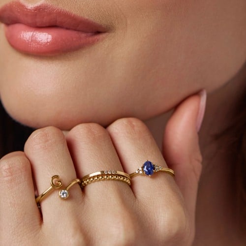 Solitaire Oval with Triple Accents Ring