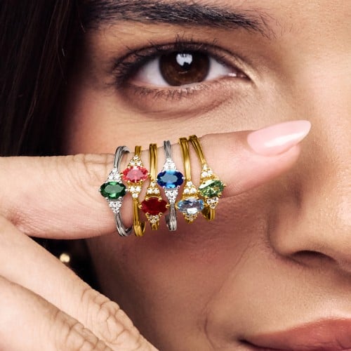 Solitaire Oval with Triple Accents Ring