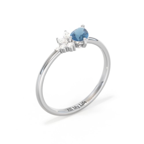 Tilted Pear Gemstone Ring with Cluster Accents – 10K White Gold with Blue Topaz and Cubic Zirconia