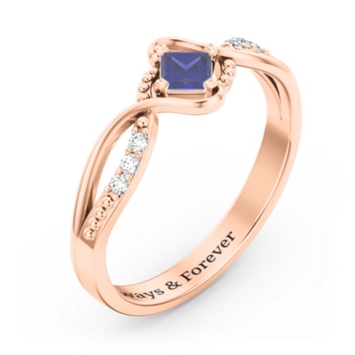 Solitaire Princess Cut Ring with Twisted Split Shank and Accents – 10K Rose Gold with Blue Sapphire and Cubic Zirconia