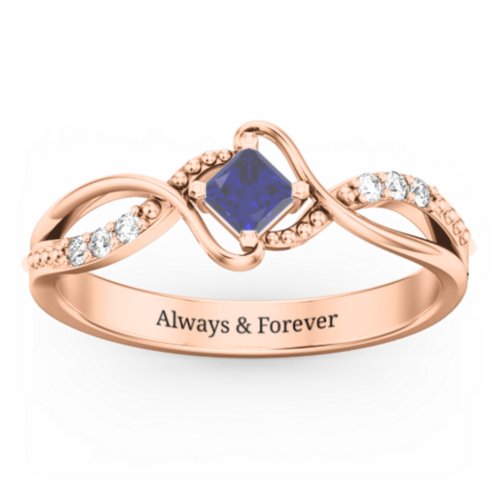 Solitaire Princess Cut Ring with Twisted Split Shank and Accents – 10K Rose Gold with Blue Sapphire and Cubic Zirconia