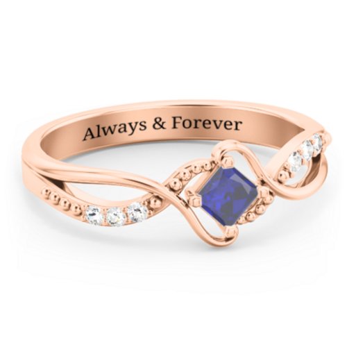 Solitaire Princess Cut Ring with Twisted Split Shank and Accents – 10K Rose Gold with Blue Sapphire and Cubic Zirconia