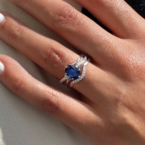 Oval Cut Gemstone Ring with Twisted Band and Accents – 10K Rose Gold with White Premium Zirconia and Fancy Blue Premium Zirconia