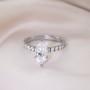 1 ct. (10x5mm) Marquise Moissanite Engagement Ring With 2mm Side Stones