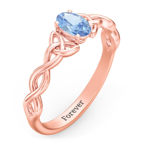 Oval Solitaire Celtic Trinity Knot Engagement Ring – 10K Rose Gold with Blue Topaz