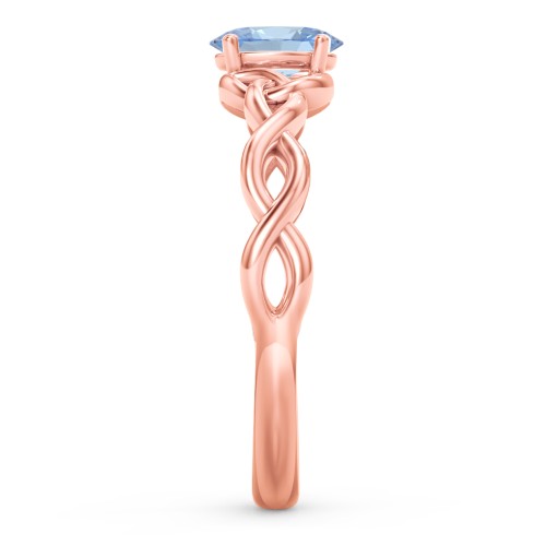 Oval Solitaire Celtic Trinity Knot Engagement Ring – 10K Rose Gold with Blue Topaz