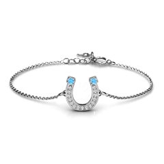 Horseshoe Bracelet with Two Stones and Accents – Sterling Silver with Blue Topaz and White Premium Zirconia
