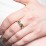 Men’s Cross Ring with East-West Baguette Gemstones – 10K Yellow Gold with Peridot and Emerald