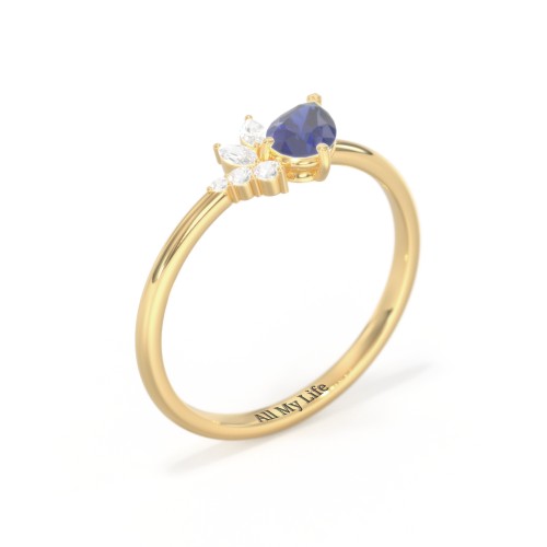 Tilted Pear Gemstone Ring with Cluster Accents – 10K Yellow Gold with Blue Sapphire and Cubic Zirconia