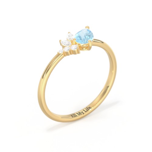 Tilted Pear Gemstone Ring with Cluster Accents – 10K Yellow Gold with Blue Topaz and Cubic Zirconia