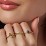 Solitaire Oval with Triple Accents Ring – 10K Rose Gold with Amethyst and White Premium Zirconia