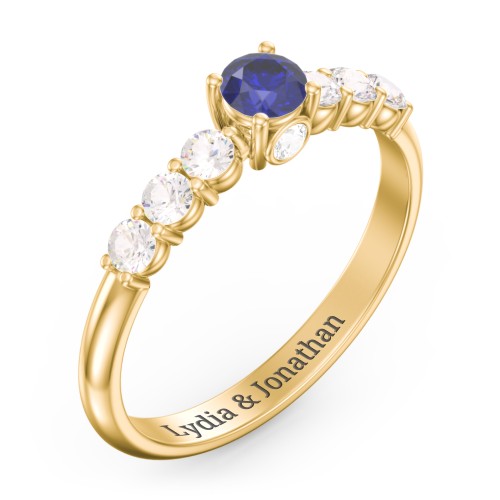 1/4 ct. Round Gemstone Peek-A-Boo Engagement Ring with Side Gemstones – 9kt Yellow Gold with Blue Sapphire and Cubic Zirconia