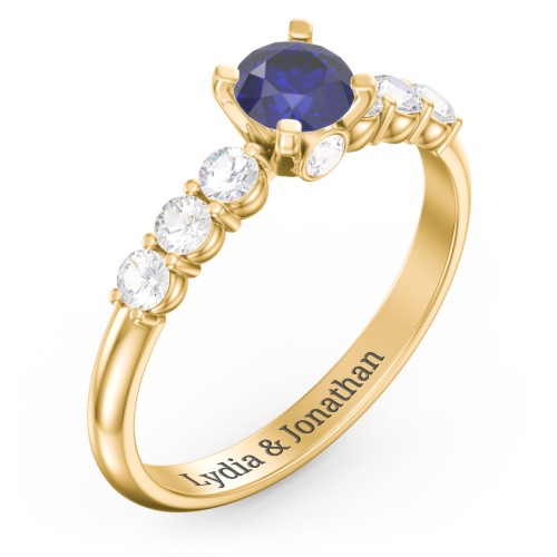 1/2 ct. Round Gemstone Peek-A-Boo Engagement Ring with Side Gemstones – 9kt Yellow Gold with Blue Sapphire and Cubic Zirconia