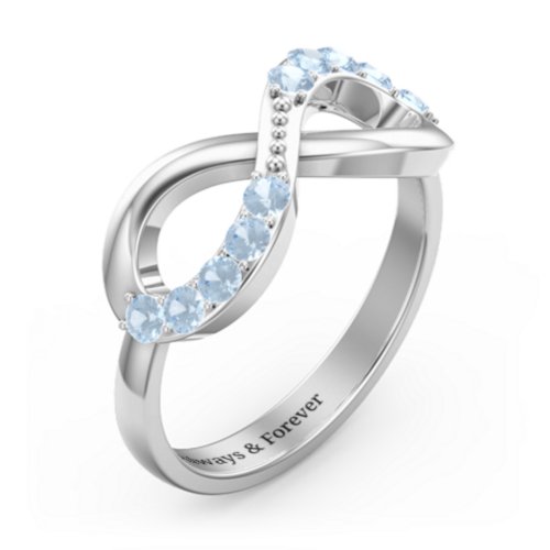 Birthstone Infinity Accent Ring – Sterling Silver with Blue Topaz