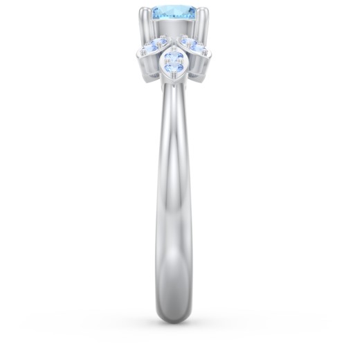 Round Birthstone Ring With Petal Accents – Sterling Silver with Blue Topaz and Fancy Blue Premium Zirconia