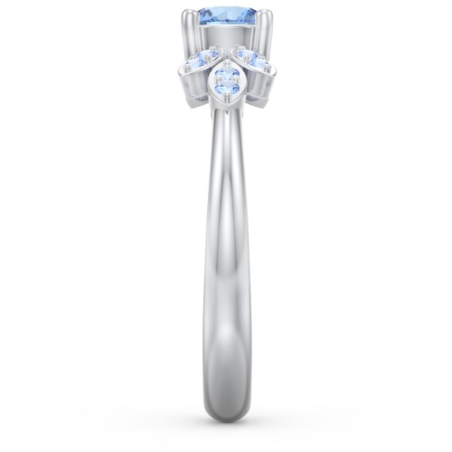 Round Birthstone Ring With Petal Accents – Sterling Silver with Blue Topaz and Fancy Blue Premium Zirconia