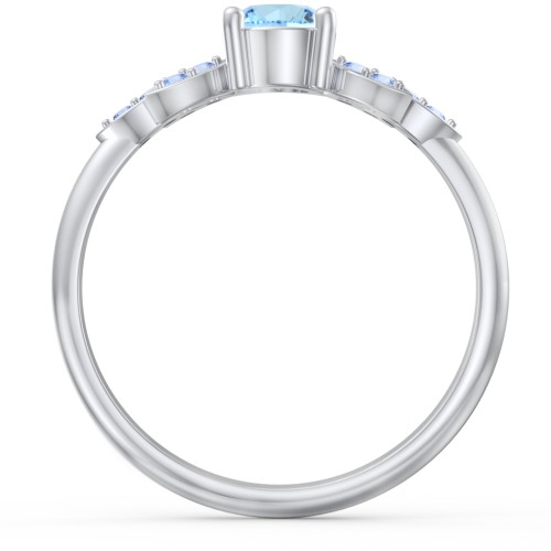 Round Birthstone Ring With Petal Accents – Sterling Silver with Blue Topaz and Fancy Blue Premium Zirconia