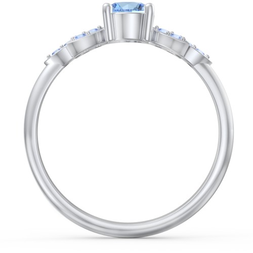 Round Birthstone Ring With Petal Accents – Sterling Silver with Blue Topaz and Fancy Blue Premium Zirconia
