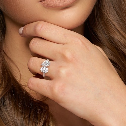 Toi et Moi Oval and Pear Moissanite Engagement Ring with Hidden Halos & Accents – 4 ctw.