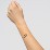 Interlocking Heart Promise Bracelet with Two Stones – 18K Gold Plated Silver with Emerald