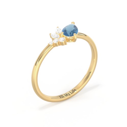 Tilted Pear Gemstone Ring with Cluster Accents – 9kt Yellow Gold with Blue Topaz and Cubic Zirconia